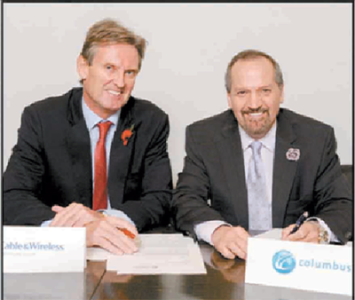 Phil Bentley, CEO, Cable & Wireless Communications, left, and Brendon Paddick, CEO and chairman of Columbus Communication